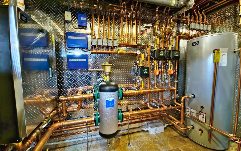 Renovated mechanical room with copper piping and a high-efficiency boiler, mechanical service in King City